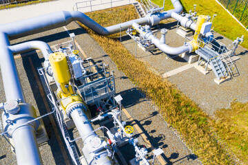 Natural gas pipeline in European Union. High pressure pipes on a hot summer day.