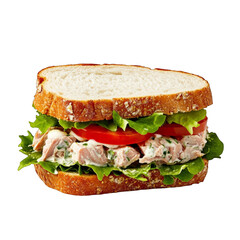 Tuna salad sandwich with lettuce tomato and mayonnaise on whole wheat bread isolated on white background healthy meal quick lunch snack food delicious fresh homemade sandwich cut out clipping path