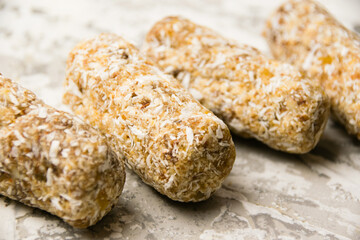Delicious homemade energy bars without sugar on light background. Diet and healthy eating concept