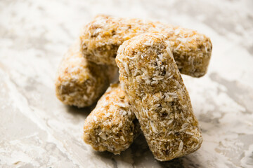 Delicious homemade energy bars without sugar on light background. Diet and healthy eating concept