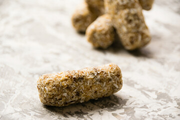 Delicious homemade energy bars without sugar on light background. Diet and healthy eating concept