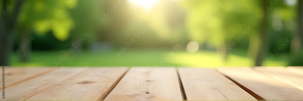 Poster a minimalist wooden tabletop with a blurred garden view provides a clean and versatile backdrop for 