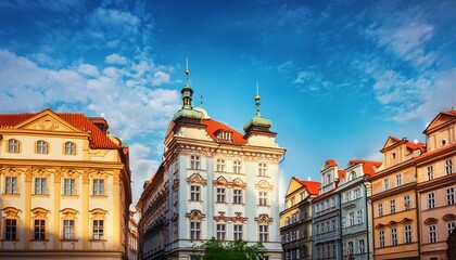 Obraz premium Sunlit Splendor: Iconic Buildings of Prague on a Clear Day