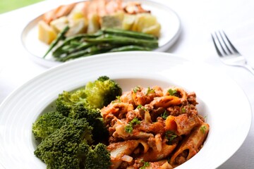 Photography of homemade plated meals. Ranging from rice dishes to wraps to chicken to pasta.