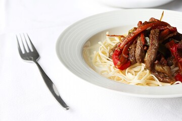 Photography of homemade plated meals. Ranging from rice dishes to wraps to chicken to pasta.