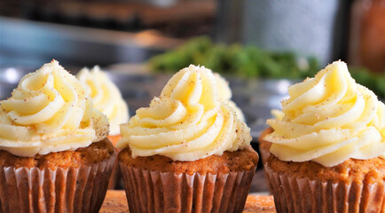 Baking carrot cupcakes with fresh carrots, spices, flour, sugar and eggs.  Spiced carrot cupcakes...