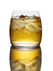 Whiskey with ice in a glass on a white background.