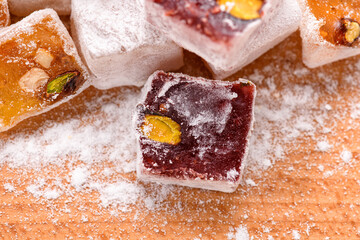 Sweet food Turkish delight, assorted rahat locum in form of cubes with nuts and powdered sugar, traditional food