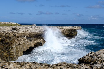 Waves Crash on the rocks at Devils Bridge National Park in Antigua