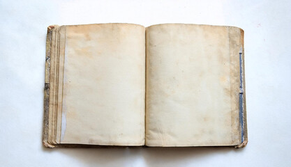 Open old book on white background top view