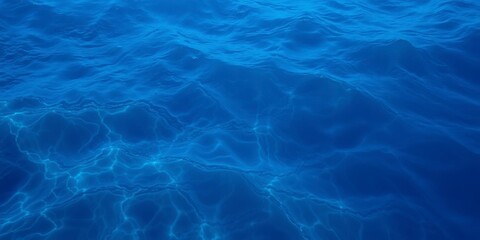 Obraz premium Abstract deep blue sea texture with wavy patterns and rippling effects, perfect for background or design element, ocean, background, aqua