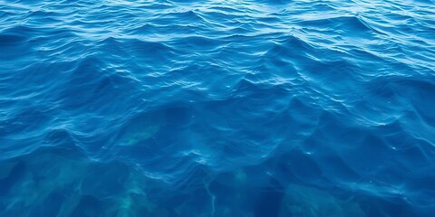 Fototapeta premium Rippling deep blue sea water texture with shades of turquoise and navy, surface, serene, beauty