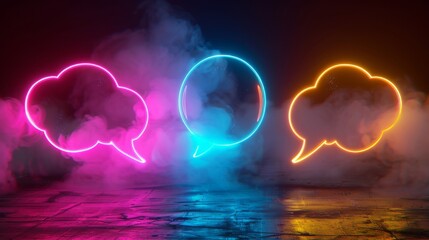 Three neon speech bubbles in pink, blue, and yellow with colorful smoke on a reflective surface