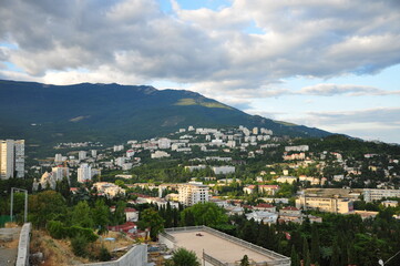 Fototapeta premium city view and mountains at the sea side