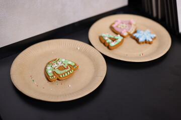 Plates filled with beautifully decorated cookies that are perfect for festive occasions