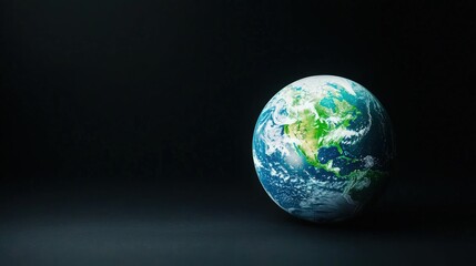 Fototapeta premium Earth globe on dark background. (1)
