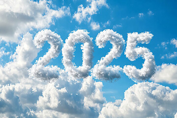 Clouds forming the numbers 2025 in a blue sky with scattered white clouds