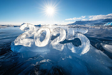 Frozen numbers 2025 carved in ice, floating on a glacier under the sunlight