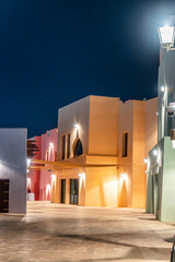 Colorful small houses and shops in the old port area in Doha, Qatar