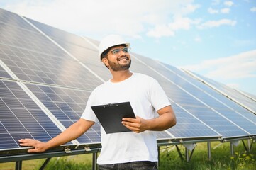 Indian Engineer near solar panel