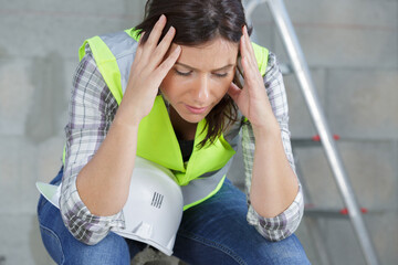 beautiful worker woman feeling fatigue and headache