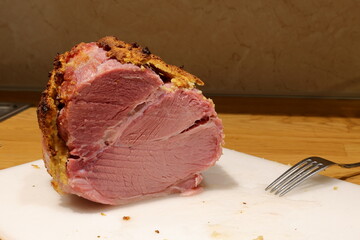 Christmas ham. Roasted pork with fork. Swedish tradition in December. 