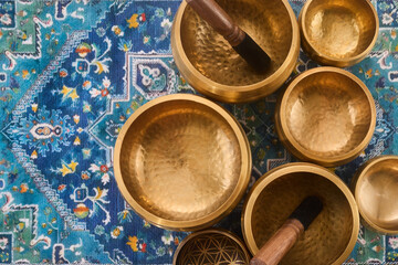 Singing Bowls on Ornate Rug