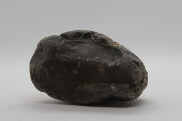 Flint stone isolated on a white background 