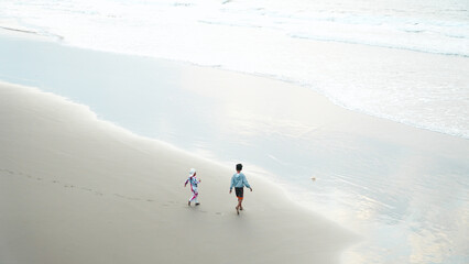 Enjoying the white-sand beach in the morning