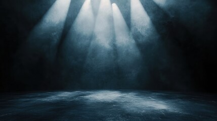 A dimly lit stage with beams of light illuminating a foggy atmosphere.