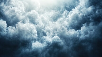 Obraz premium Dramatic dark storm cloudscape with bright light.