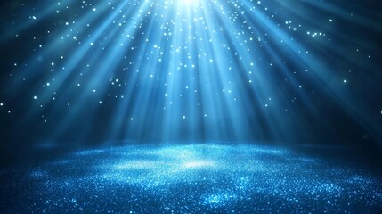 Bright blue light rays shining on glittering surface.