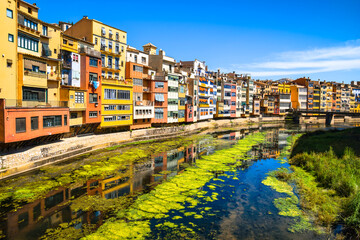 Colorful yellow and orange houses  in Girona, Catalonia, Spain.