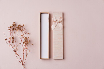 gift box with cream background. top view