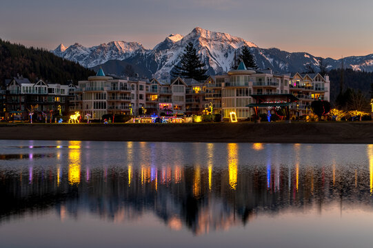 Harrison Hot Springs in winter with Mount Cheam Range in the background. Harrison Hot Springs in winter with Mount Cheam Range in the background. All decked out for the holiday season.