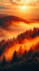 Fototapeta premium Misty mountains bathed in warm orange and yellow hues at sunset, symbolizing tranquility and the beauty of nature's chaos, a perfect high-definition phone wallpaper to evoke peace and awe
