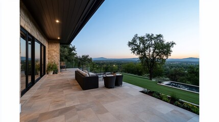 Modern patio with a scenic view at dusk.