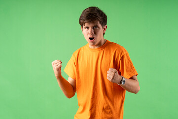 Young person expressing various emotions and body pains, pointing, using a cellphone, with colored backgrounds and wearing shirts of different colors