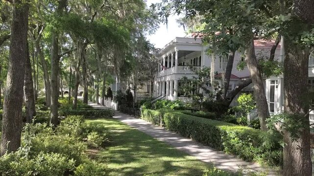 Approaching shot of beautiful southern homes in the American South of South Carolina.