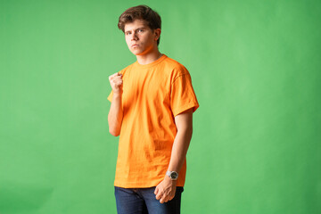 Young person expressing various emotions and body pains, pointing, using a cellphone, with colored...