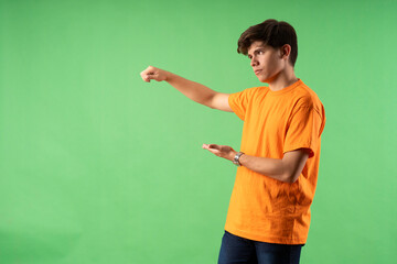 Young person expressing various emotions and body pains, pointing, using a cellphone, with colored backgrounds and wearing shirts of different colors