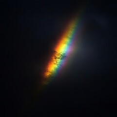 Obraz premium Ethereal Rainbow Streaks Across Dark Sky
