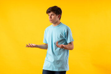 Young person expressing various emotions and body pains, pointing, using a cellphone, with colored...