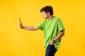 Young person expressing various emotions and body pains, pointing, using a cellphone, with colored...
