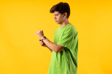 Young person expressing various emotions and body pains, pointing, using a cellphone, with colored...