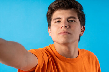 Young person expressing various emotions and body pains, pointing, using a cellphone, with colored...