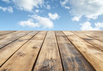 Rustic wooden surface with clear blue sky and fluffy clouds, perfect for backgrounds, textures, and natural-themed designs that evoke tranquility and harmony.