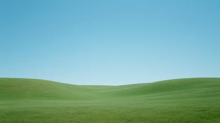 Fototapeta premium Lush Green Rolling Hills Under a Clear Blue Sky Offering a Tranquil and Serene Landscape Ideal for Relaxation and Nature-Themed Projects