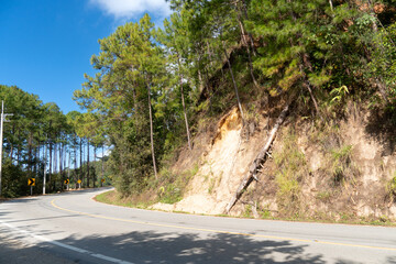 Generated ImageLandscape view of the asphalt road.Winding path along the edge of the mountain. Under blue sky. At Rak Chang Viewpoint, Pai, Mae Hong Son, Thailand.