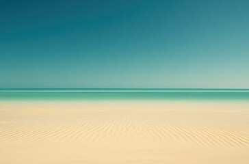 Obraz premium Tranquil Seascape with Serene Blue Waters and Sandy Beach Under a Clear Sky, Perfect for Relaxation, Travel Inspiration, and Nature Imagery